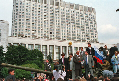 FILE - In this file photo taken on Monday, Aug. 19, 1991, Boris Yeltsin, with papers in hand, president of the Russian Federation, makes a speech from atop a tank in front of the Russian parliament building in Moscow, U.S.S.R. No picture better tells the story of Russia's failed 1991 coup than that of a fist-pumping Boris Yeltsin defying Communist hard-liners from the top of a tank. Those who were by Yeltsin's side describe his decision 20 years ago Friday to climb onto the tank as a stroke of political brilliance that proved crucial for the defeat of the coup. (AP Photo, file)